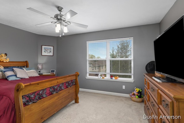 8485 E Center Park Dr SW Unit 18, Byron Center, MI 49315 - bedroom featuring baseboards, light colored carpet, and ceiling fan