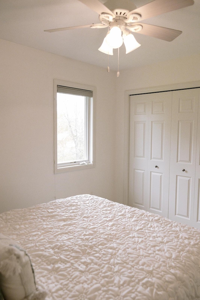 bedroom featuring a closet and ceiling fan