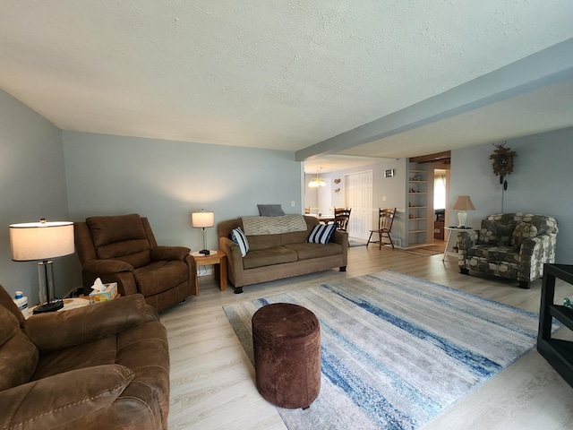 3034 Royalton Heights Rd, Saint Joseph, MI 49085 - living area with light wood-type flooring and a textured ceiling