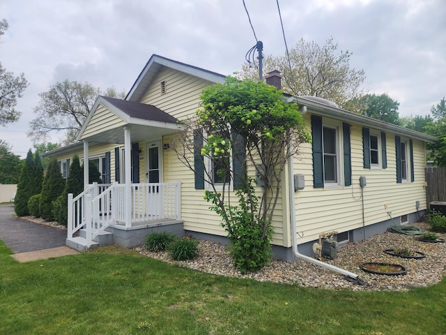 3034 Royalton Heights Rd, Saint Joseph, MI 49085 - view of front of home featuring a front yard and a chimney