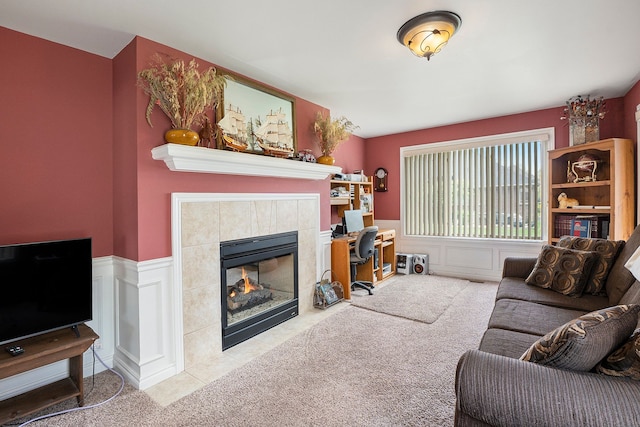 55796 Caesars Dr, Shelby Twp, MI 48315 - living room with carpet flooring, a tiled fireplace, and a wainscoted wall