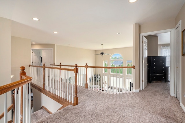 55796 Caesars Dr, Shelby Twp, MI 48315 - hallway featuring carpet floors, an upstairs landing, healthy amount of natural light, recessed lighting, and baseboards