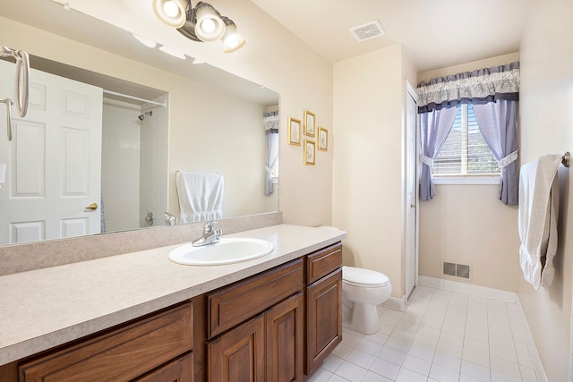 55796 Caesars Dr, Shelby Twp, MI 48315 - full bathroom with tile patterned floors, toilet, baseboards, vanity, and a shower