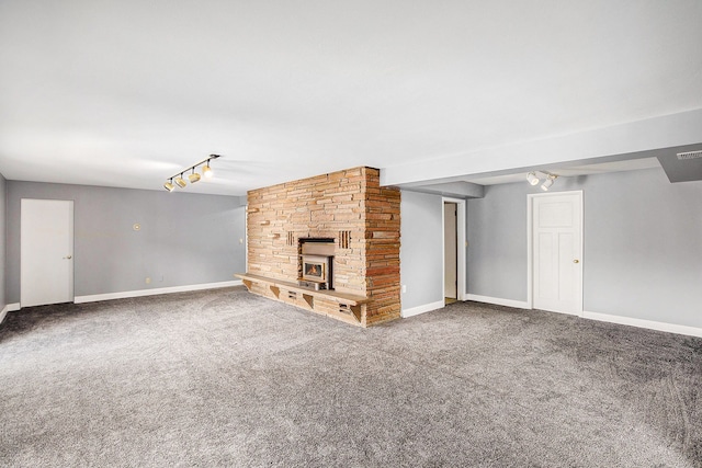 8411 Jordan Rd, Grand Blanc, MI 48439 - unfurnished living room featuring carpet floors, a fireplace, and baseboards