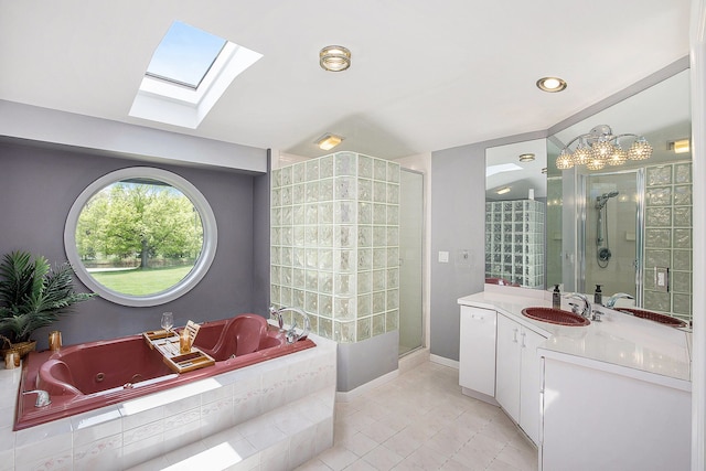 8411 Jordan Rd, Grand Blanc, MI 48439 - full bath featuring a skylight, a stall shower, tile patterned flooring, and vanity