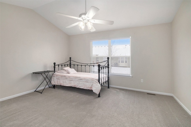 860 Woodhaven Dr, Commerce Twp, MI 48390 - carpeted bedroom with baseboards, lofted ceiling, and ceiling fan