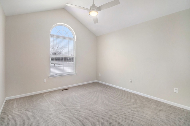 860 Woodhaven Dr, Commerce Twp, MI 48390 - empty room featuring light carpet, a ceiling fan, baseboards, and lofted ceiling