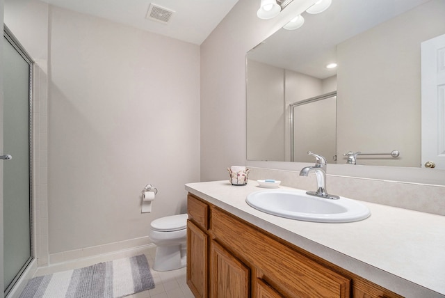 860 Woodhaven Dr, Commerce Twp, MI 48390 - full bathroom featuring a shower stall, toilet, vanity, baseboards, and tile patterned flooring