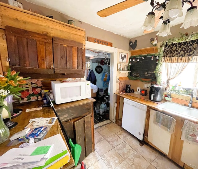 603 Broadway Ave, Owosso, MI 48867 - kitchen featuring white appliances and a sink