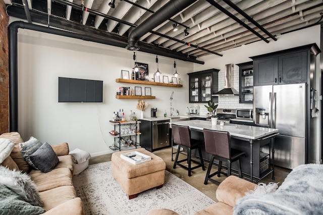 2987 Franklin St Unit 5-2D, Detroit, MI 48207 - living room with bar and baseboards