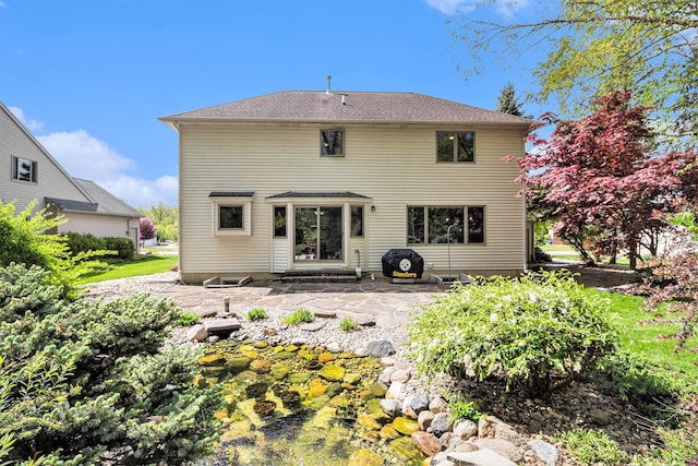 454 Breconshire Dr, Saline, MI 48176 - rear view of property featuring a patio area