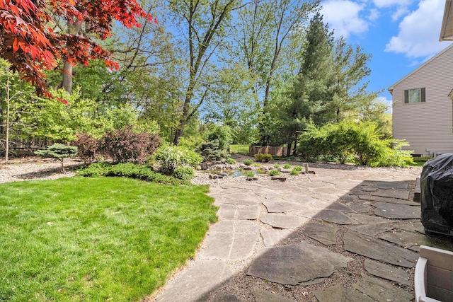 454 Breconshire Dr, Saline, MI 48176 - view of grassy yard with a patio