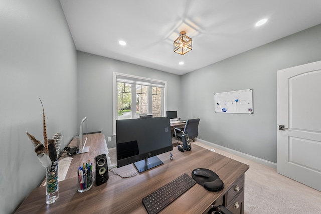 office space with recessed lighting and baseboards