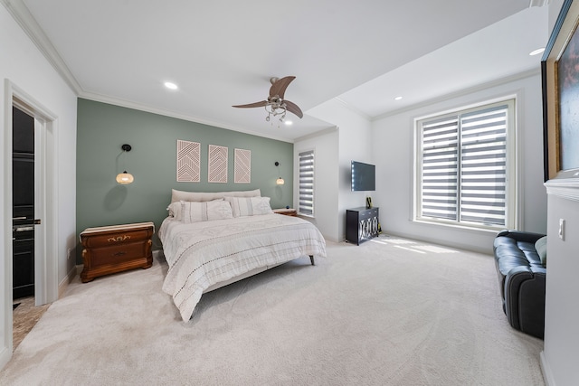 carpeted bedroom with crown molding, a ceiling fan, baseboards, and recessed lighting