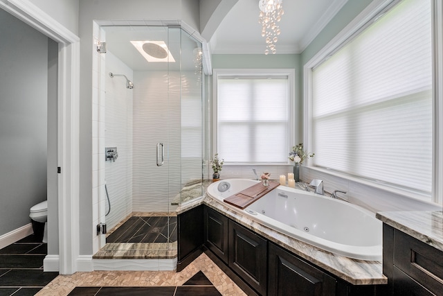 full bath featuring a shower stall, a tub with jets, toilet, crown molding, and a chandelier