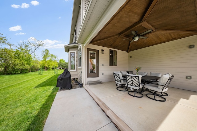 view of patio featuring ceiling fan and outdoor dining area