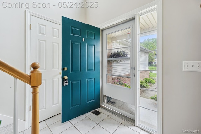 7366 Meadow Ln, Ypsilanti, MI 48197 - entryway with light tile patterned floors and stairway