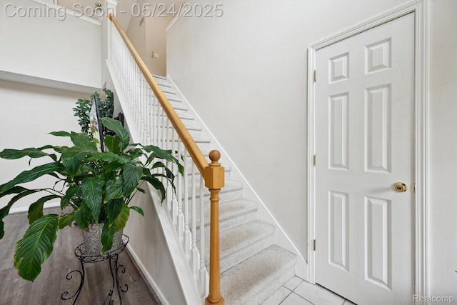 7366 Meadow Ln, Ypsilanti, MI 48197 - stairway featuring tile patterned floors and baseboards