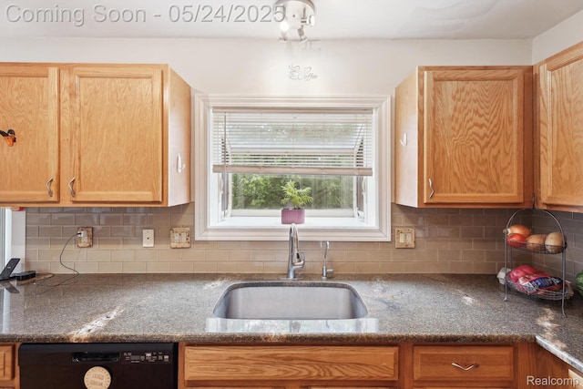7366 Meadow Ln, Ypsilanti, MI 48197 - kitchen featuring black dishwasher, a sink, and tasteful backsplash