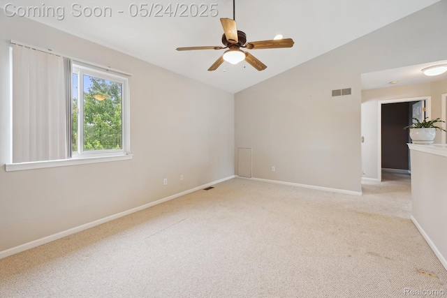 7366 Meadow Ln, Ypsilanti, MI 48197 - spare room with lofted ceiling, carpet, a ceiling fan, and baseboards