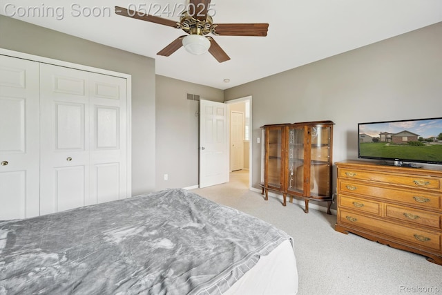 7366 Meadow Ln, Ypsilanti, MI 48197 - bedroom with carpet, a closet, and ceiling fan