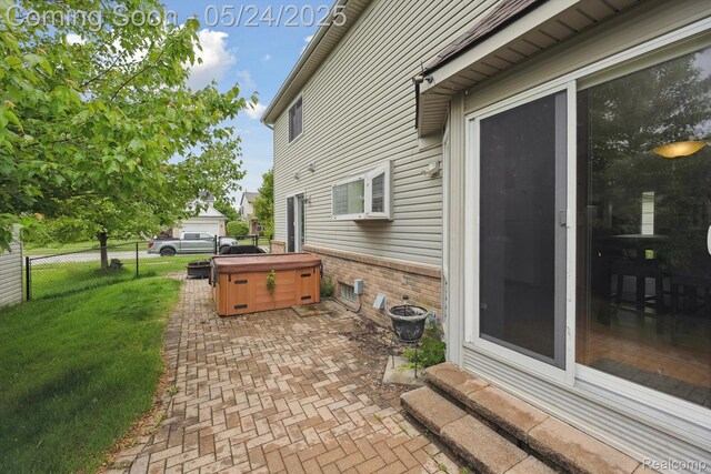 7366 Meadow Ln, Ypsilanti, MI 48197 - view of patio / terrace featuring a hot tub