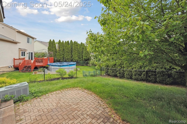 7366 Meadow Ln, Ypsilanti, MI 48197 - view of yard with a deck and a patio