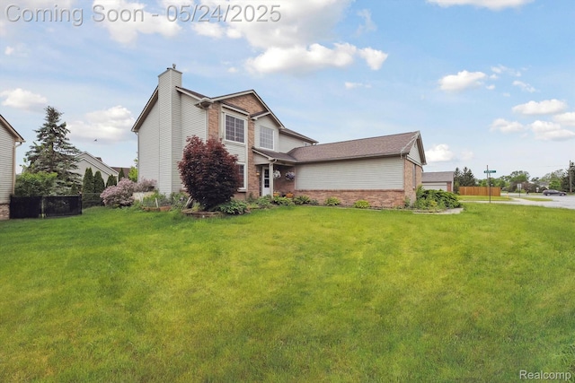 7366 Meadow Ln, Ypsilanti, MI 48197 - view of home's exterior with a chimney and brick siding