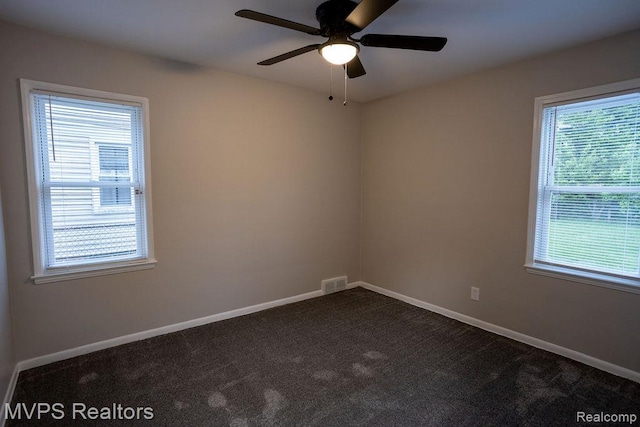 20484 Roscommon St, Harper Woods, MI 48225 - unfurnished room with ceiling fan, dark carpet, and baseboards