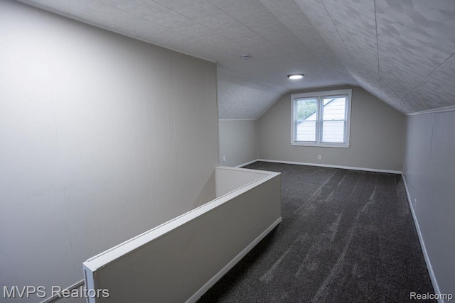 20484 Roscommon St, Harper Woods, MI 48225 - additional living space featuring dark carpet and lofted ceiling
