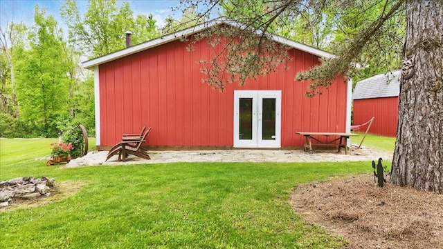 view of outdoor structure featuring french doors