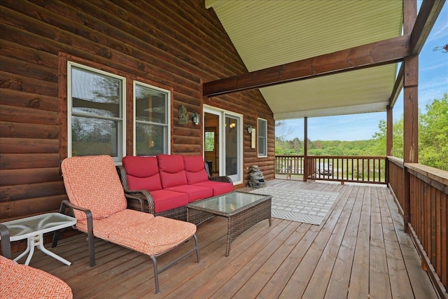 wooden deck featuring outdoor lounge area