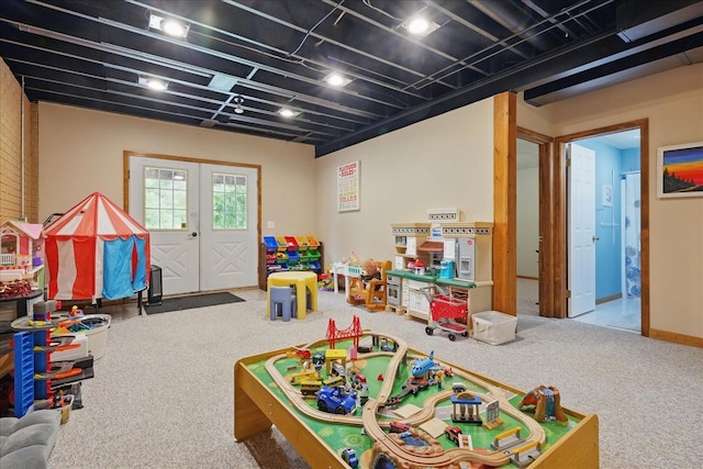 playroom featuring carpet and french doors