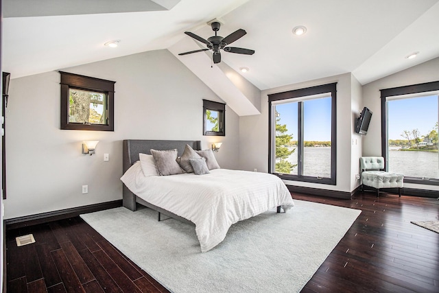 bedroom featuring multiple windows, vaulted ceiling, baseboards, and recessed lighting