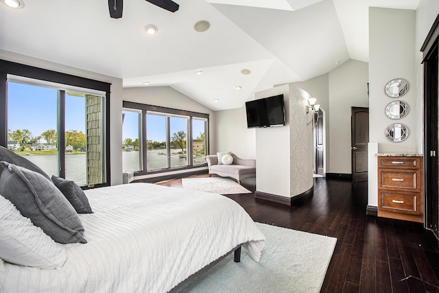 bedroom with lofted ceiling, hardwood / wood-style flooring, baseboards, and recessed lighting