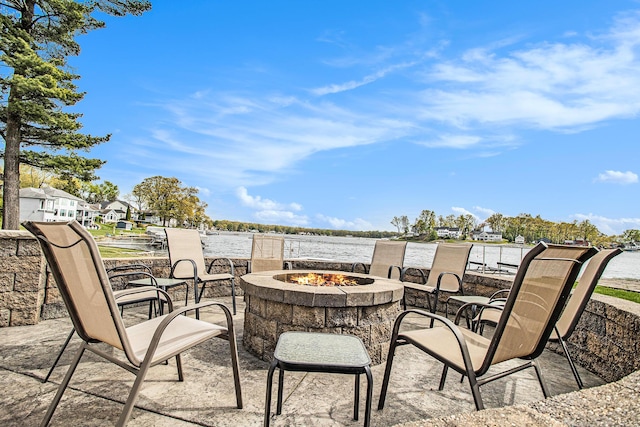 view of patio with an outdoor fire pit