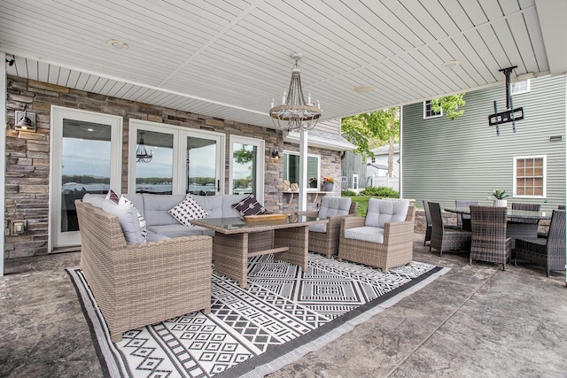 view of patio with outdoor dining space and an outdoor hangout area