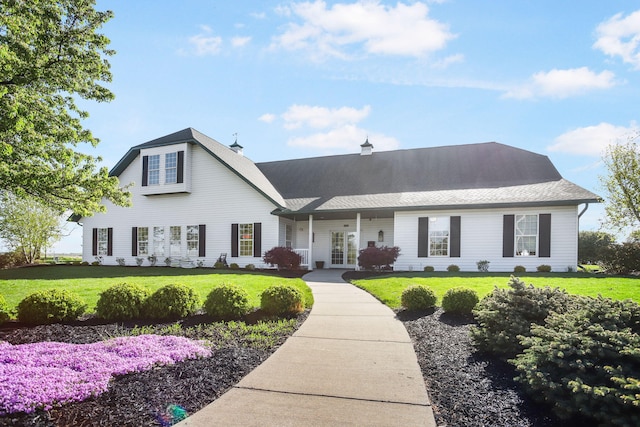 view of front facade with a front lawn