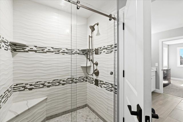 8353 Pier Point Ct, South Lyon, MI 48178 - bathroom with a shower stall