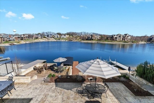 8353 Pier Point Ct, South Lyon, MI 48178 - dock featuring a water view, a patio, and a residential view