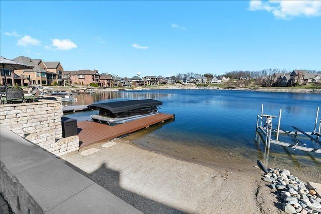 8353 Pier Point Ct, South Lyon, MI 48178 - dock with a residential view and a water view