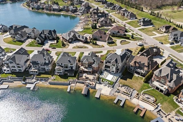 8353 Pier Point Ct, South Lyon, MI 48178 - aerial view of residential area featuring a nearby body of water