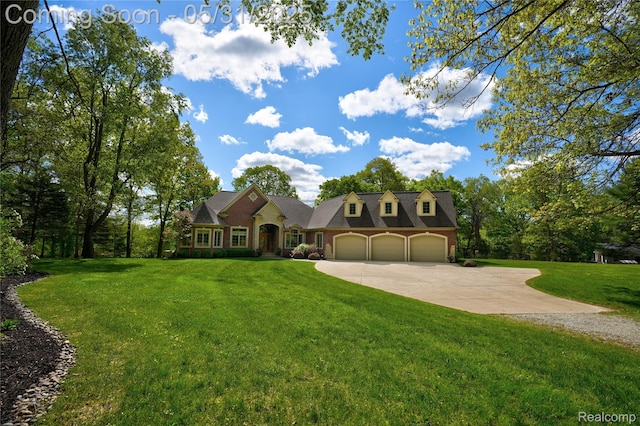 3074 Pond Rd, Leonard, MI 48367 - view of front facade with an attached garage, concrete driveway, and a front lawn