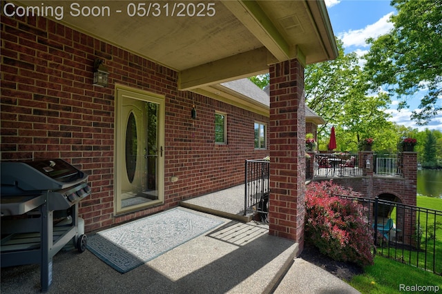 3074 Pond Rd, Leonard, MI 48367 - view of patio featuring a grill