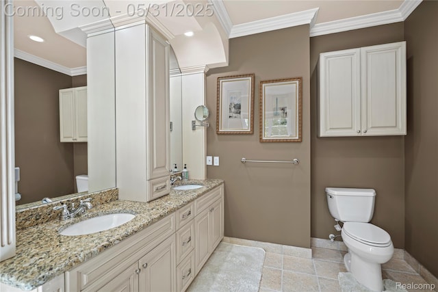 3074 Pond Rd, Leonard, MI 48367 - bathroom with toilet, crown molding, double vanity, baseboards, and ornate columns