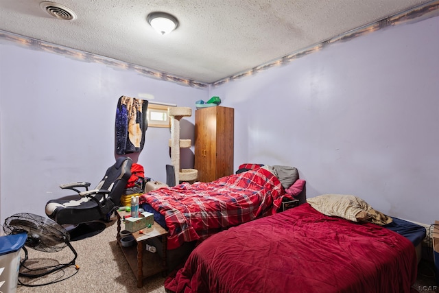 5309 Treat Hwy, Adrian, MI 49221 - bedroom with a textured ceiling and carpet floors
