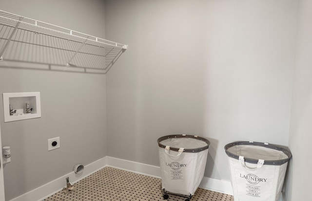 101 Addison Cir, Walled Lake, MI 48390 - laundry area with hookup for a washing machine, electric dryer hookup, and baseboards