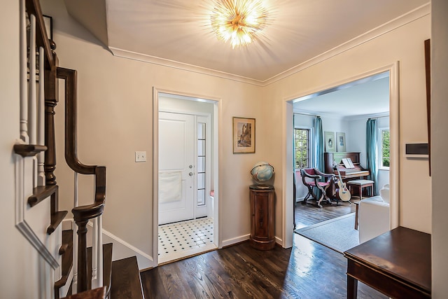 2124 Brockman Blvd, Ann Arbor, MI 48104 - entryway featuring dark wood-style flooring, baseboards, ornamental molding, and stairway