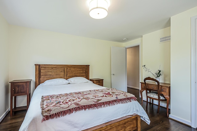 2124 Brockman Blvd, Ann Arbor, MI 48104 - bedroom with dark wood-style flooring and baseboards