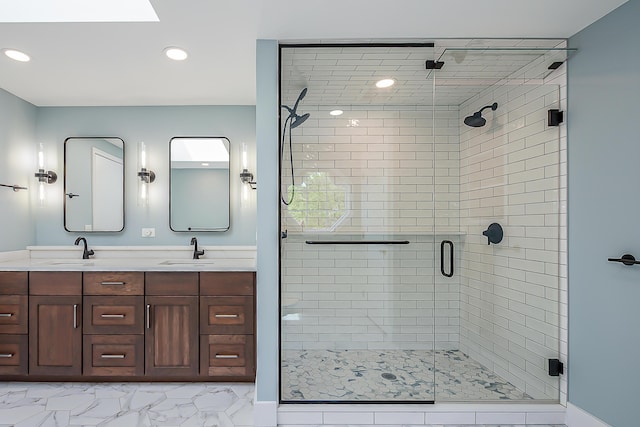 2124 Brockman Blvd, Ann Arbor, MI 48104 - bathroom featuring a shower stall, double vanity, recessed lighting, and a skylight